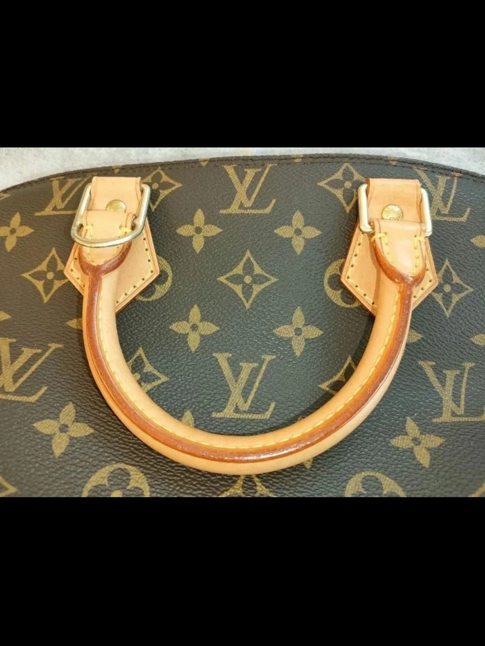 Louis Vuitton Monogram Alma Satchel in Brown and Tan